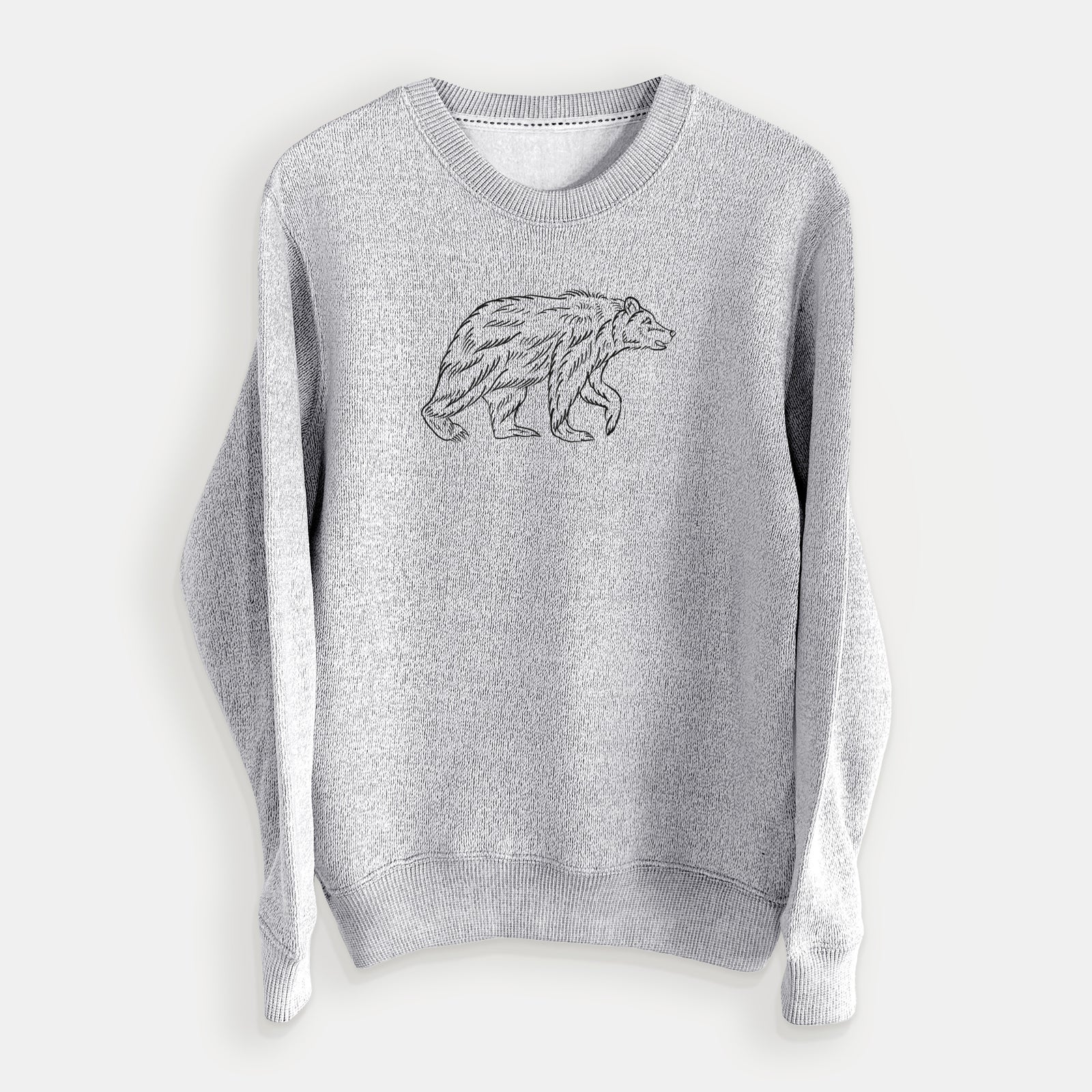 Salt and pepper knit sweatshirt laid flat, printed with a black ink illustration of a brown bear walking.