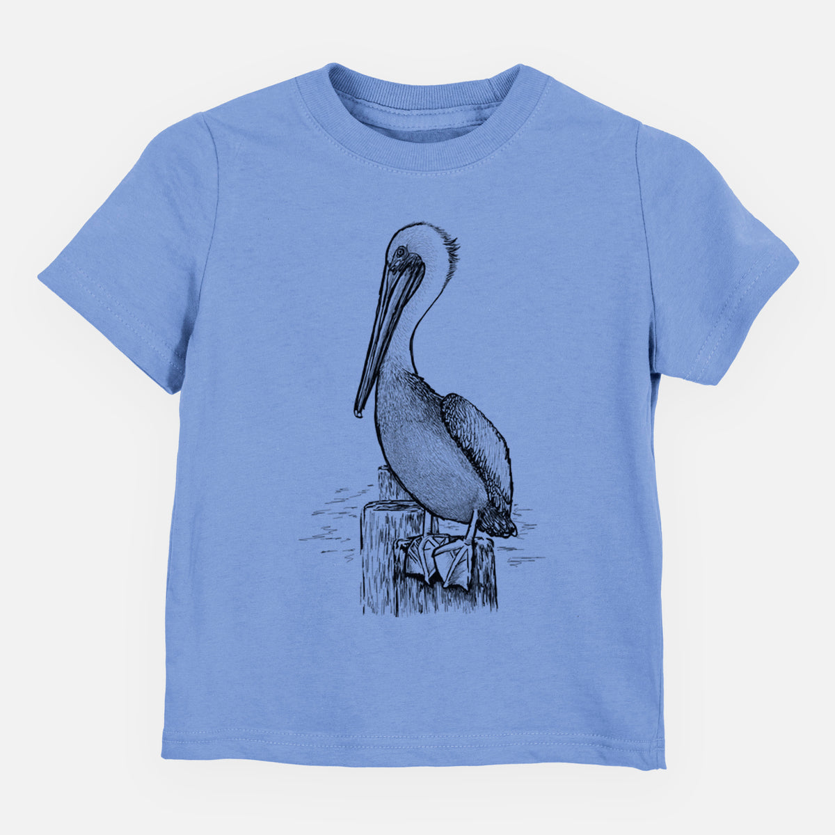 Carolina blue toddler t-shirt laid flat, printed with a detailed black ink illustration of a brown pelican perched on a wooden piling.