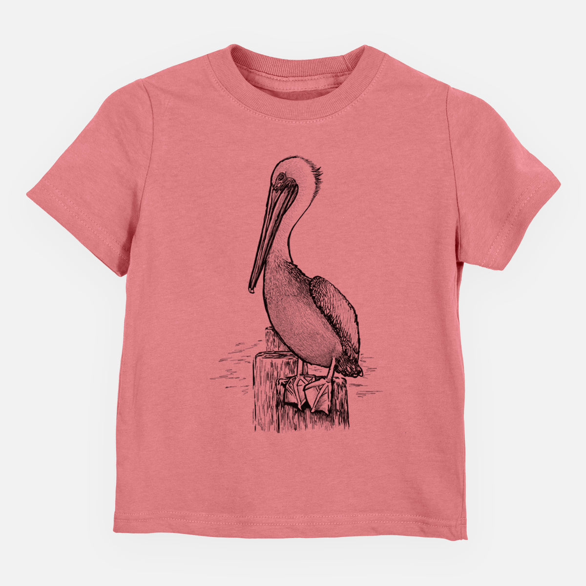 Mauve pink toddler t-shirt laid flat, printed with a detailed black ink illustration of a brown pelican perched on a wooden piling.