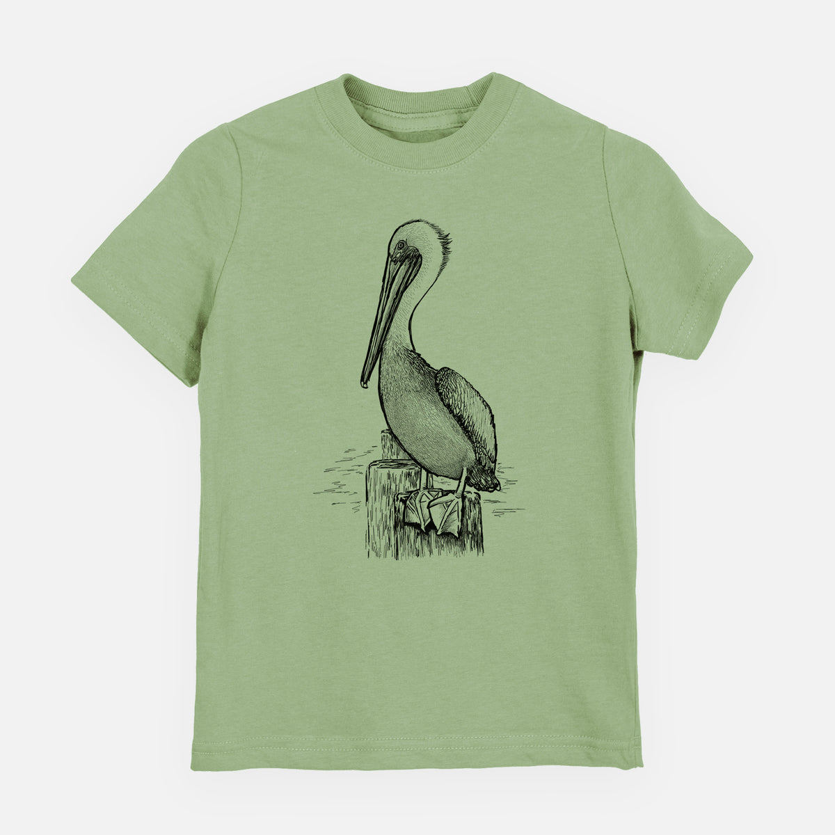 Sage green youth t-shirt laid flat, printed with a detailed black ink illustration of a brown pelican perched on a wooden piling.
