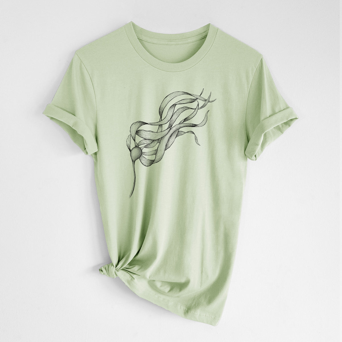 Spring green lightweight cotton t-shirt laid flat with the sleeves rolled, printed with a black ink line drawing of a strand of bull kelp with long flowing blades.