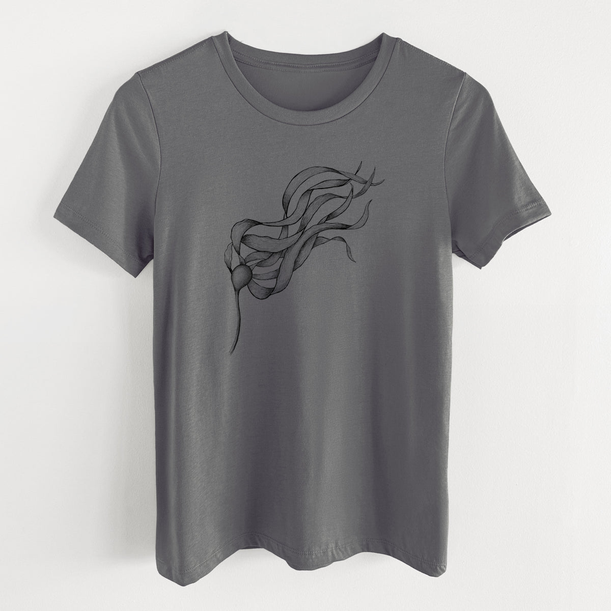 Asphalt women's relaxed fit cotton t-shirt laid flat, printed with a black ink line drawing of a strand of bull kelp with long flowing blades.