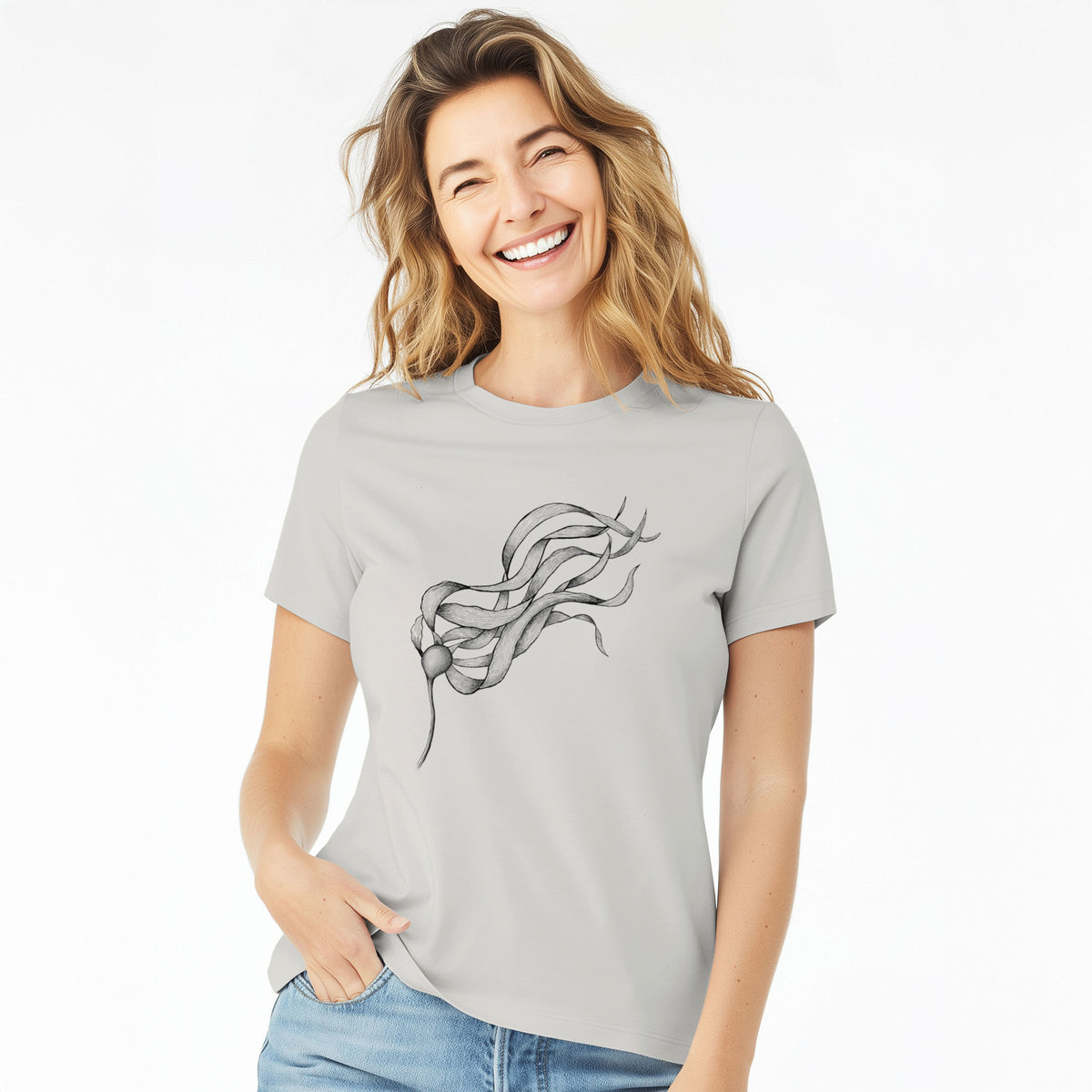 Woman wearing a lunar grey women's relaxed fit cotton t-shirt printed with a black ink line drawing of a strand of bull kelp with long flowing blades.