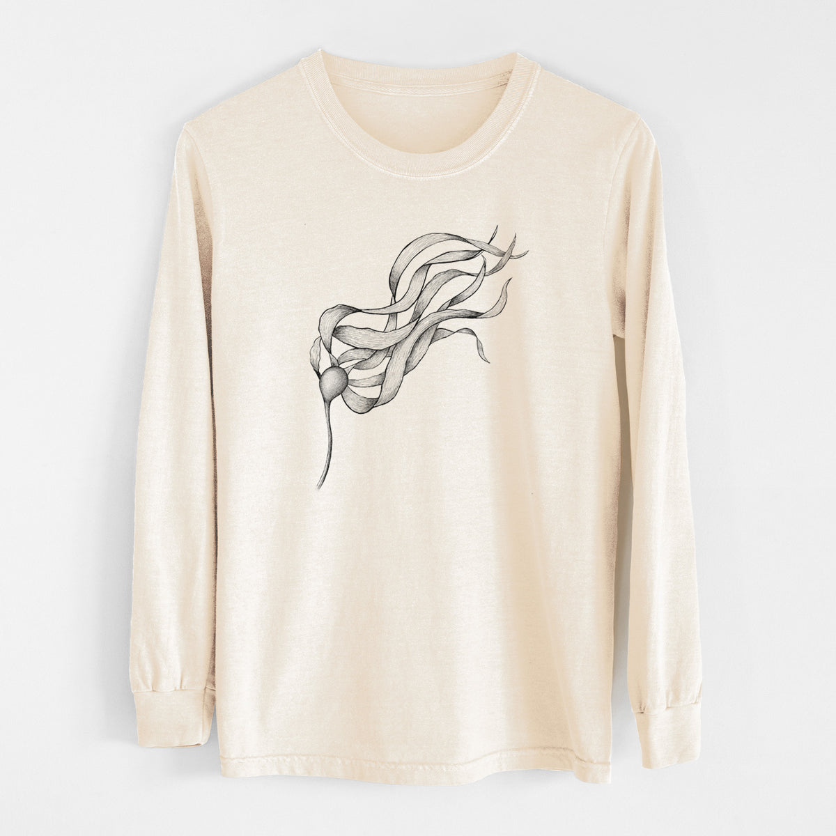 Ivory Comfort Colors long sleeve shirt laid flat, printed with a black ink line drawing of a strand of bull kelp with long flowing blades.
