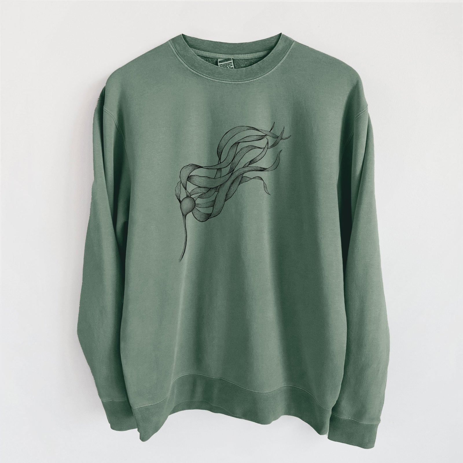 Alpine green pigment dyed crewneck sweatshirt laid flat, printed with a black ink line drawing of a strand of bull kelp with long flowing blades.