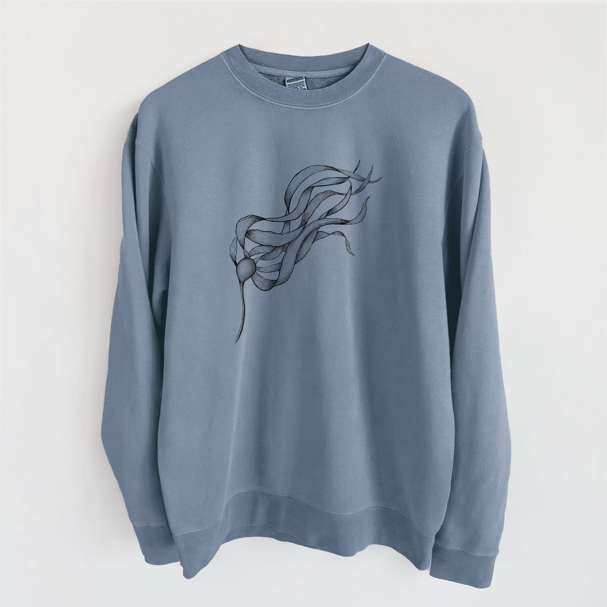 Slate blue pigment dyed crewneck sweatshirt laid flat, printed with a black ink line drawing of a strand of bull kelp with long flowing blades.