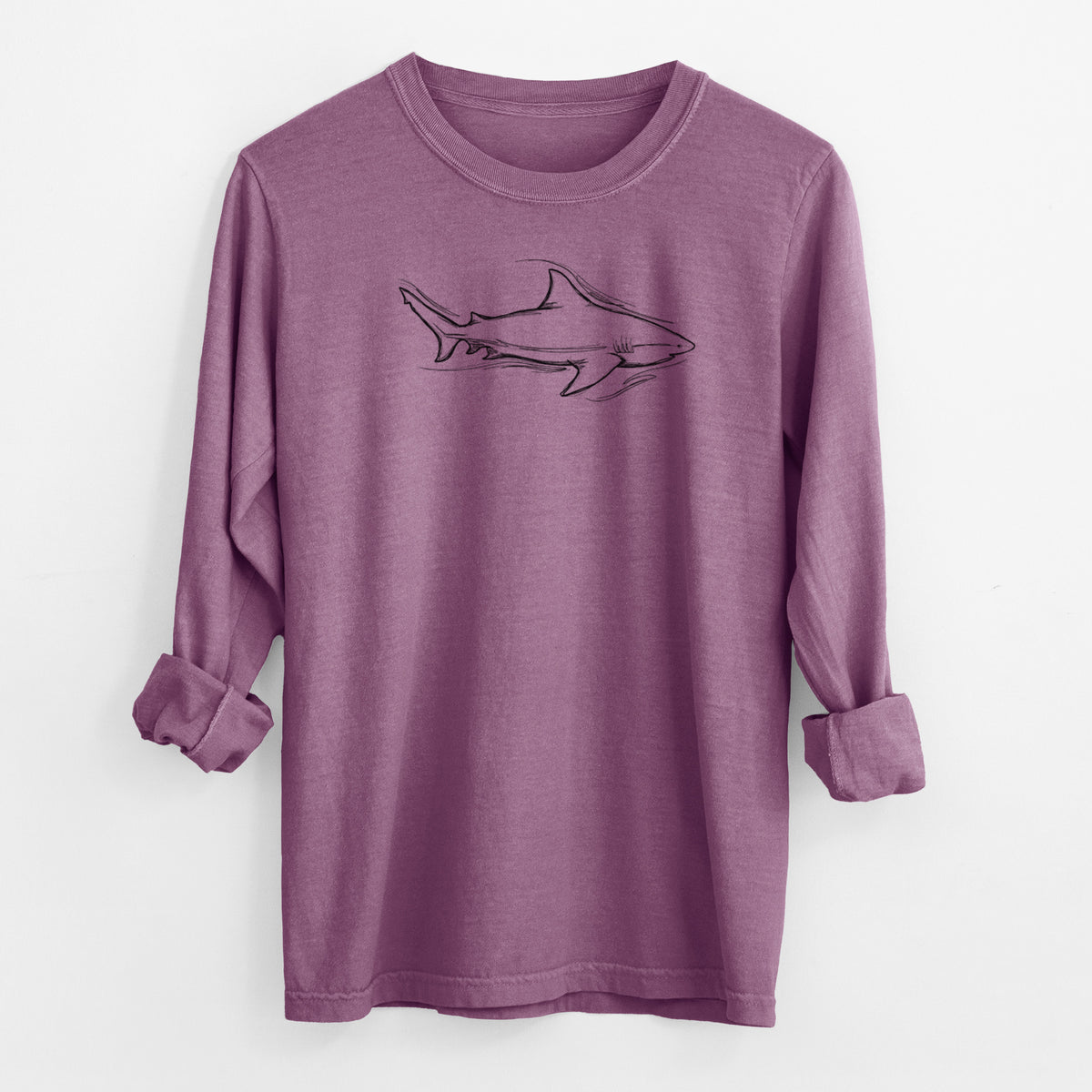Berry pink Comfort Colors long sleeve shirt laid flat with the cuffs rolled, printed with a black ink illustration of a bull shark swimming.