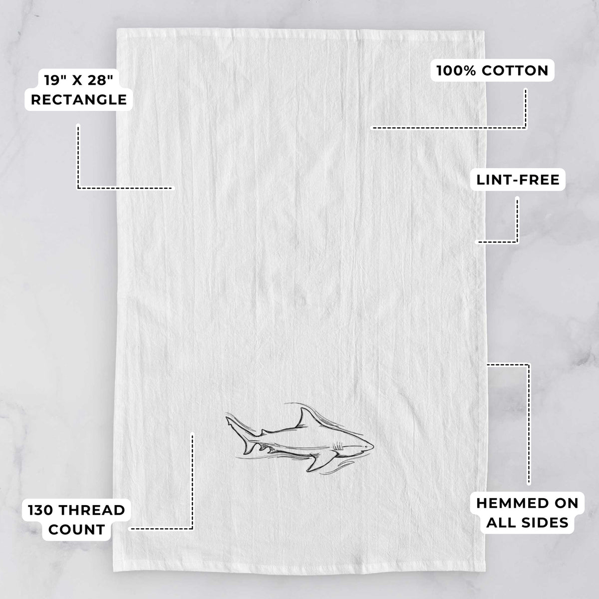 White tea towel printed with a black ink illustration of a bull shark swimming, with feature labels: 19 by 28 inch rectangle, 100% cotton, lint-free, 130 thread count, hemmed on all sides.