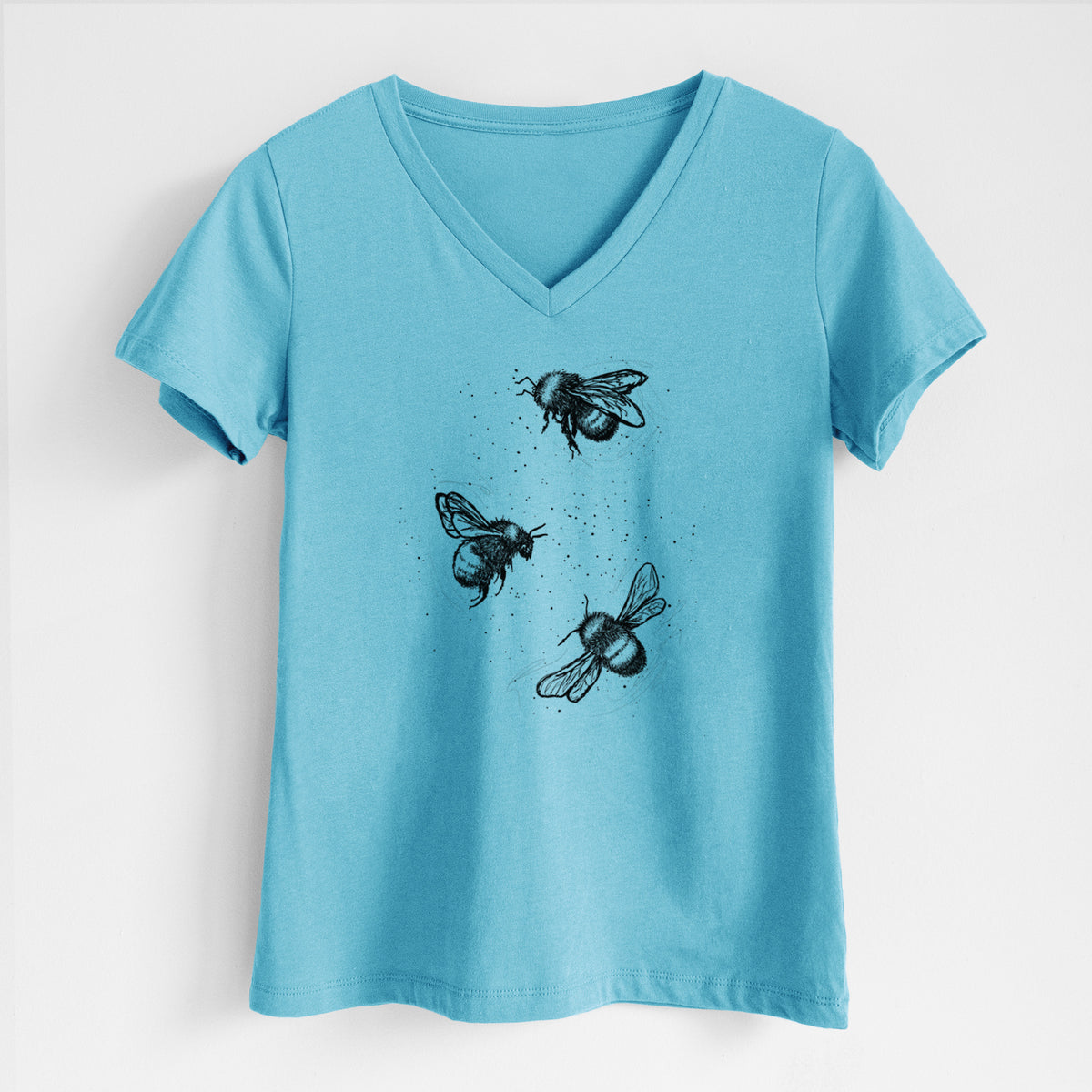 Turquoise women's relaxed fit cotton V-neck t-shirt laid flat, printed with a black ink illustration of three bumble bees flying.