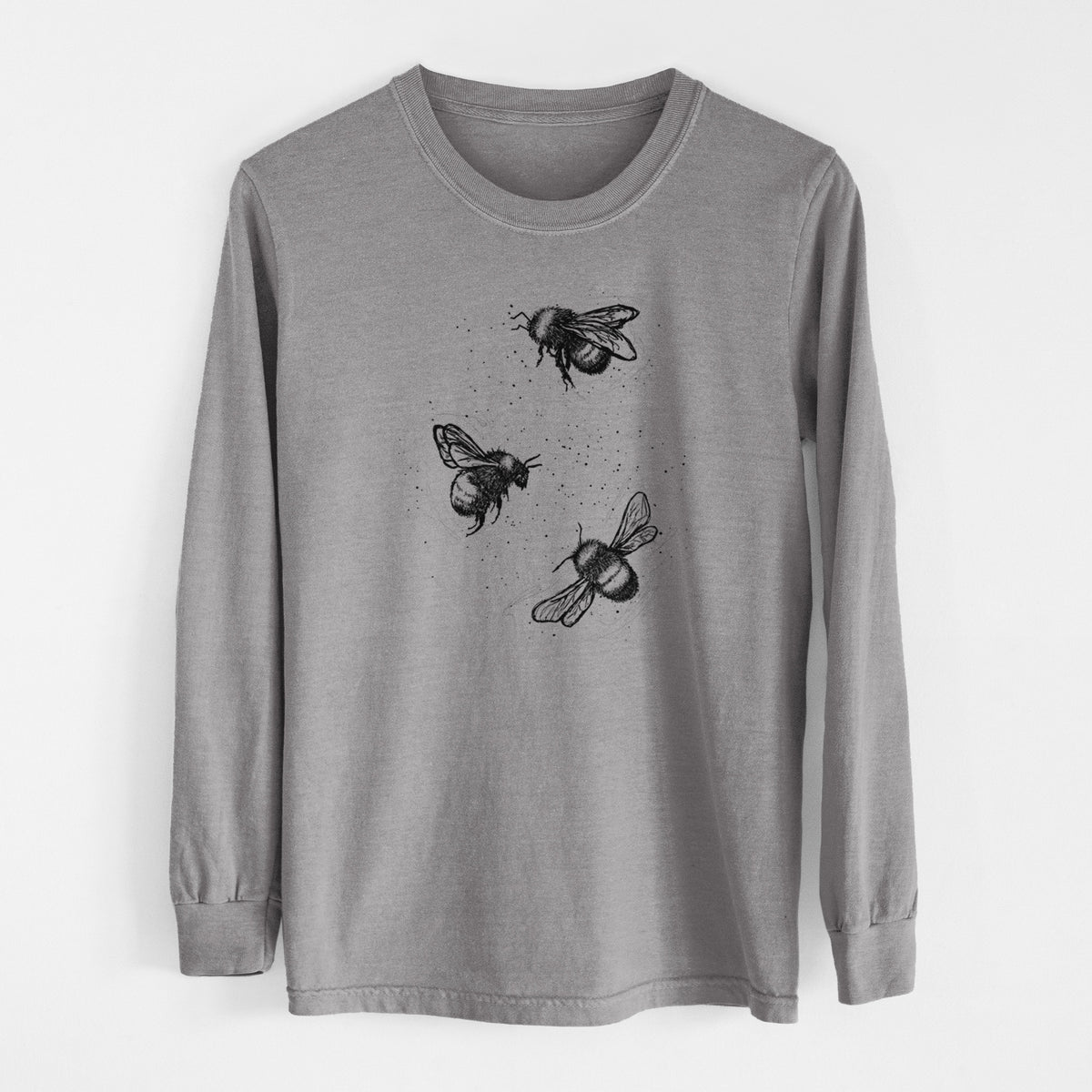 Grey Comfort Colors long sleeve shirt laid flat, printed with a black ink illustration of three bumble bees flying.