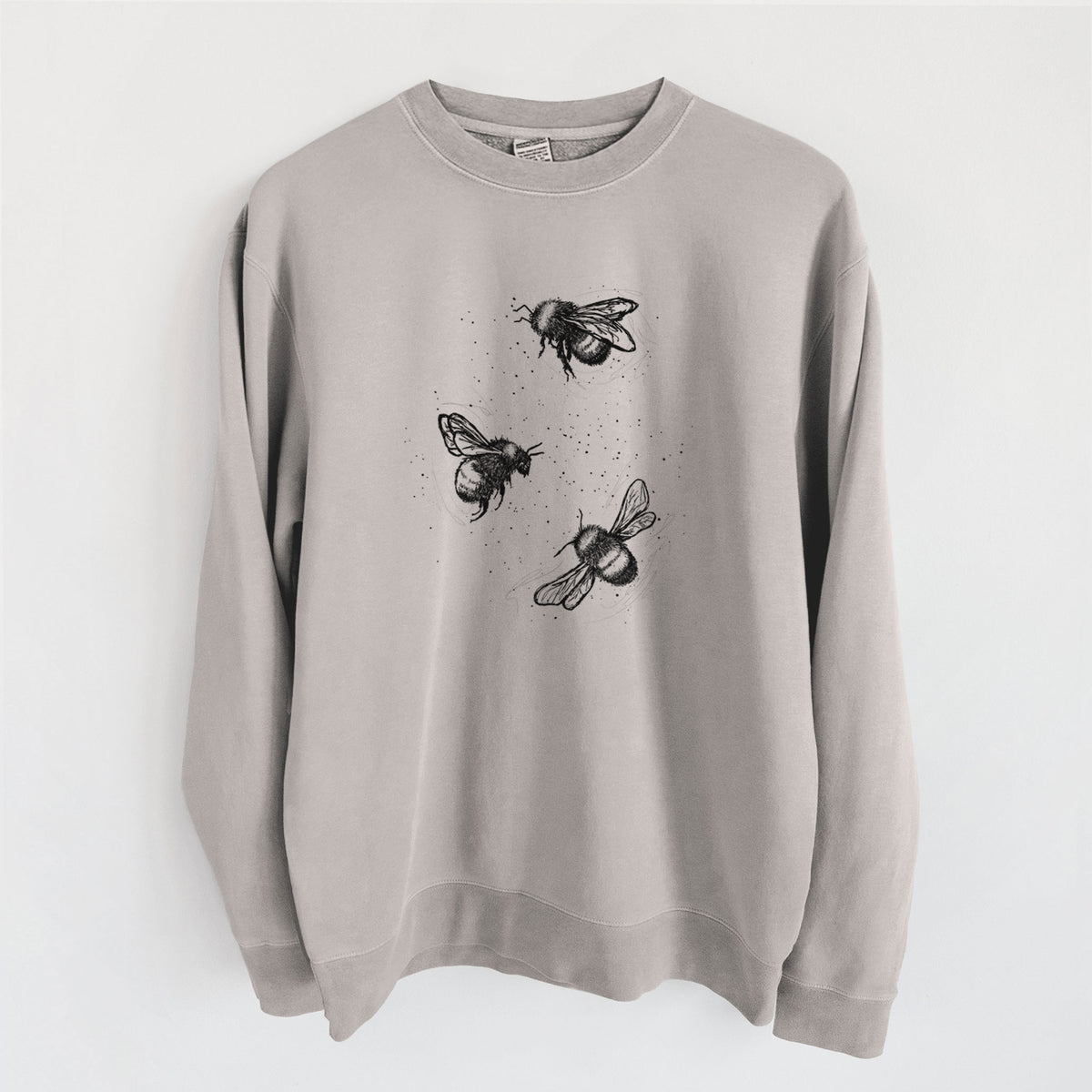 Cement grey pigment dyed crewneck sweatshirt laid flat, printed with a black ink illustration of three bumble bees flying.