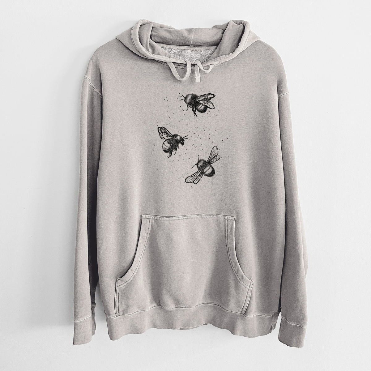 Cement grey pigment dyed hoodie laid flat, printed with a black ink illustration of three bumble bees flying.