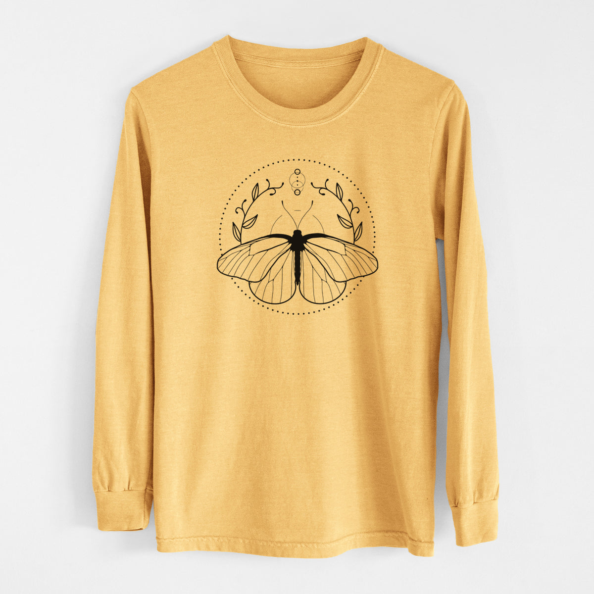 Golden wheat yellow Comfort Colors long sleeve shirt laid flat, printed with a black ink butterfly inside a circle, framed by moon phases and leaves.