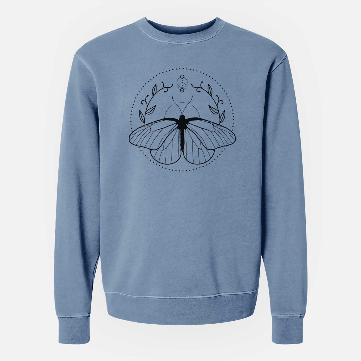 Slate blue pigment dyed crewneck sweatshirt laid flat, printed with a black ink butterfly inside a circle, framed by moon phases and leaves.