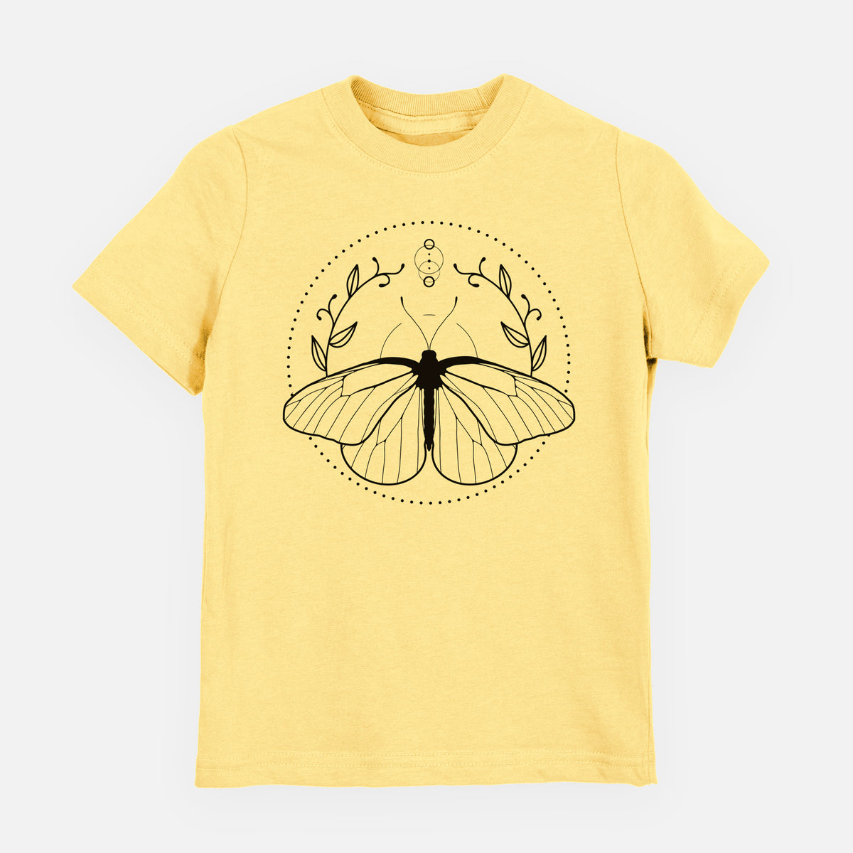 Butter yellow youth t-shirt laid flat, printed with a black ink butterfly inside a circle, framed by moon phases and leaves.