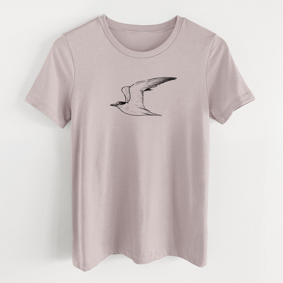 Pink gravel women's relaxed fit cotton t-shirt laid flat, printed with a black ink illustration of a California least tern in flight.