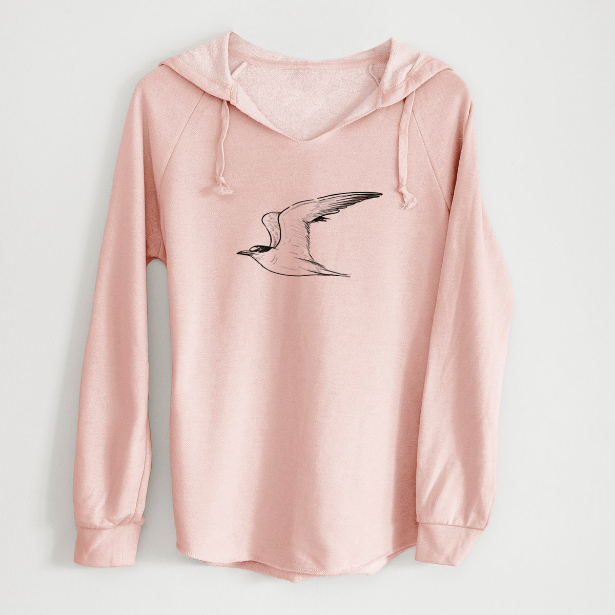 Blush pink women's Cali Wave hooded sweatshirt laid flat, printed with a black ink illustration of a California least tern in flight.