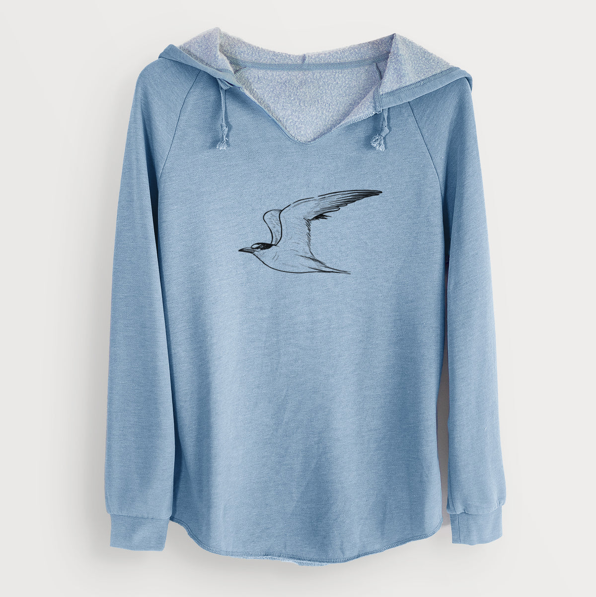 Misty blue women's Cali Wave hooded sweatshirt laid flat, printed with a black ink illustration of a California least tern in flight.