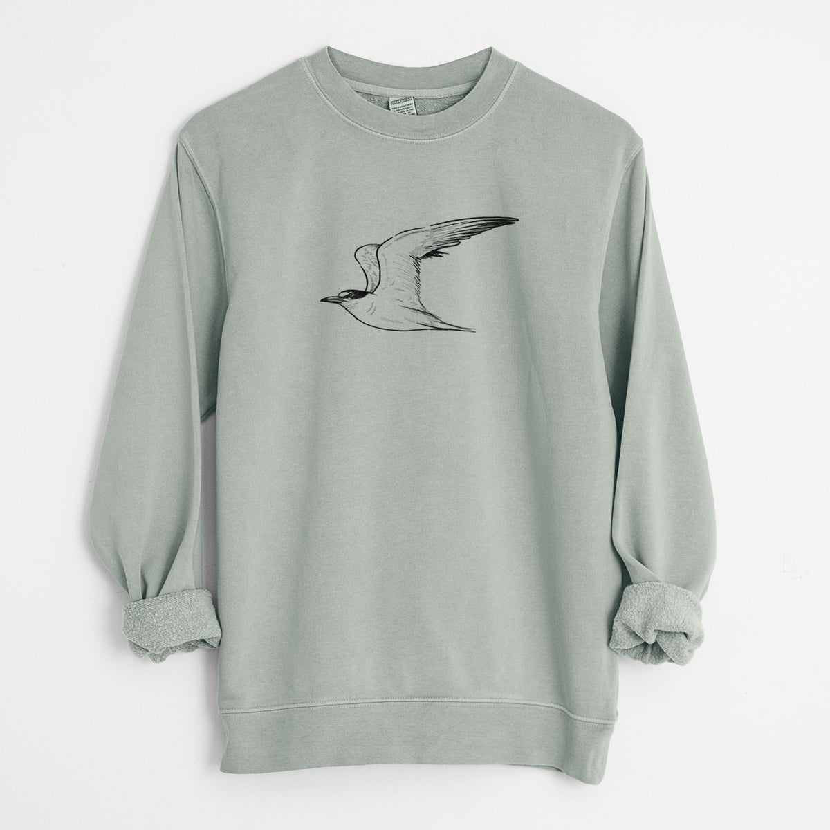 Sage green pigment dyed crewneck sweatshirt laid flat with the sleeves rolled, printed with a black ink illustration of a California least tern in flight.