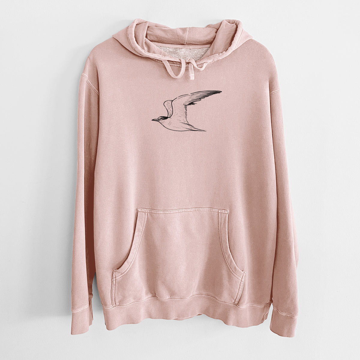 Dusty pink pigment dyed hoodie laid flat, printed with a black ink illustration of a California least tern in flight.