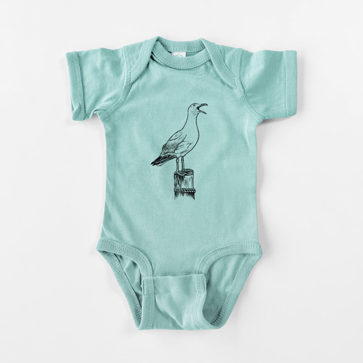 Saltwater baby bodysuit laid flat, printed with a black ink illustration of a California gull calling from a wooden post.