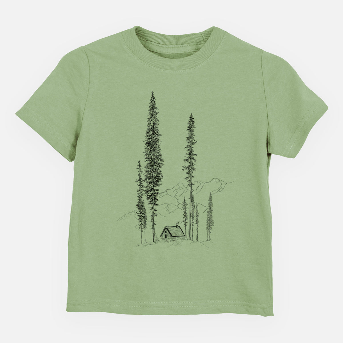 Sage green toddler t-shirt laid flat, printed with a black ink illustration of a small cabin nestled beneath towering pine trees.