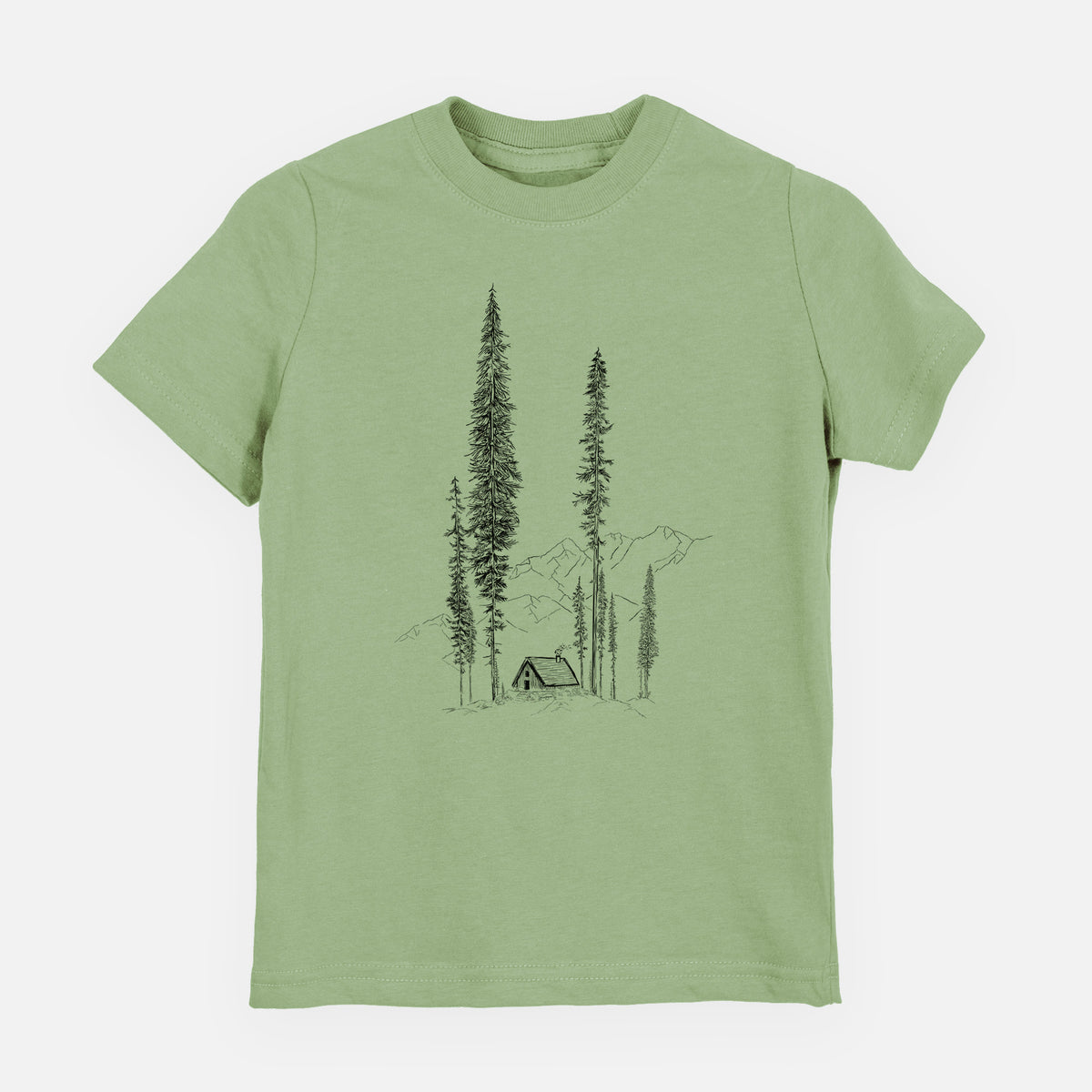 Sage green youth t-shirt laid flat, printed with a black ink illustration of a small cabin nestled beneath towering pine trees.
