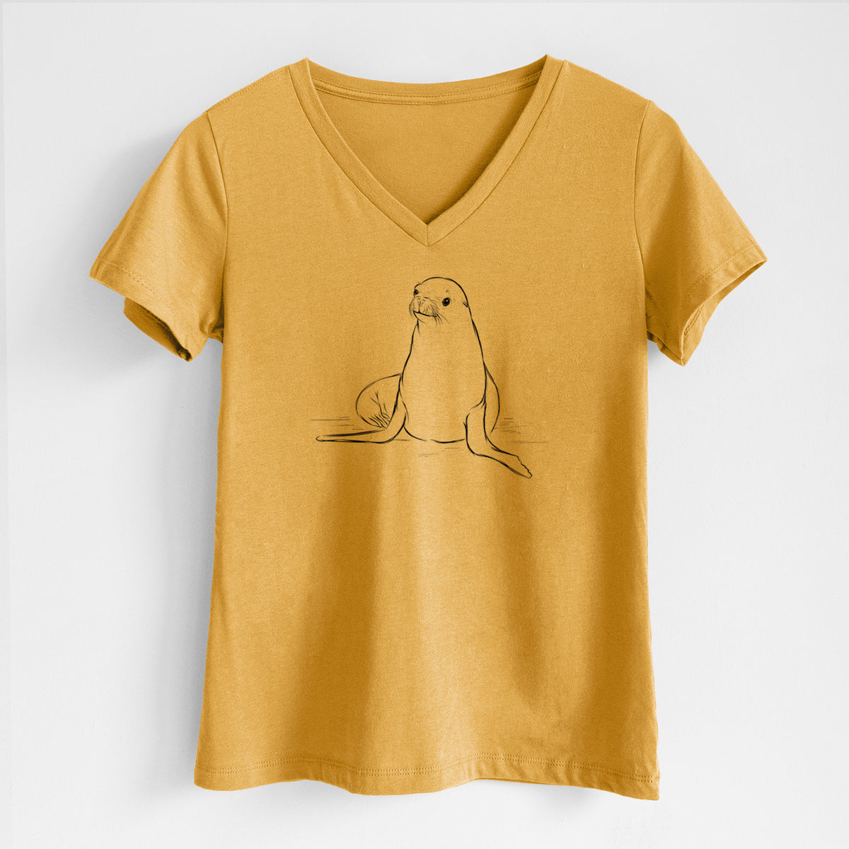 Honeycomb yellow women's relaxed fit cotton V-neck t-shirt laid flat, printed with a black ink illustration of a California sea lion sitting upright.