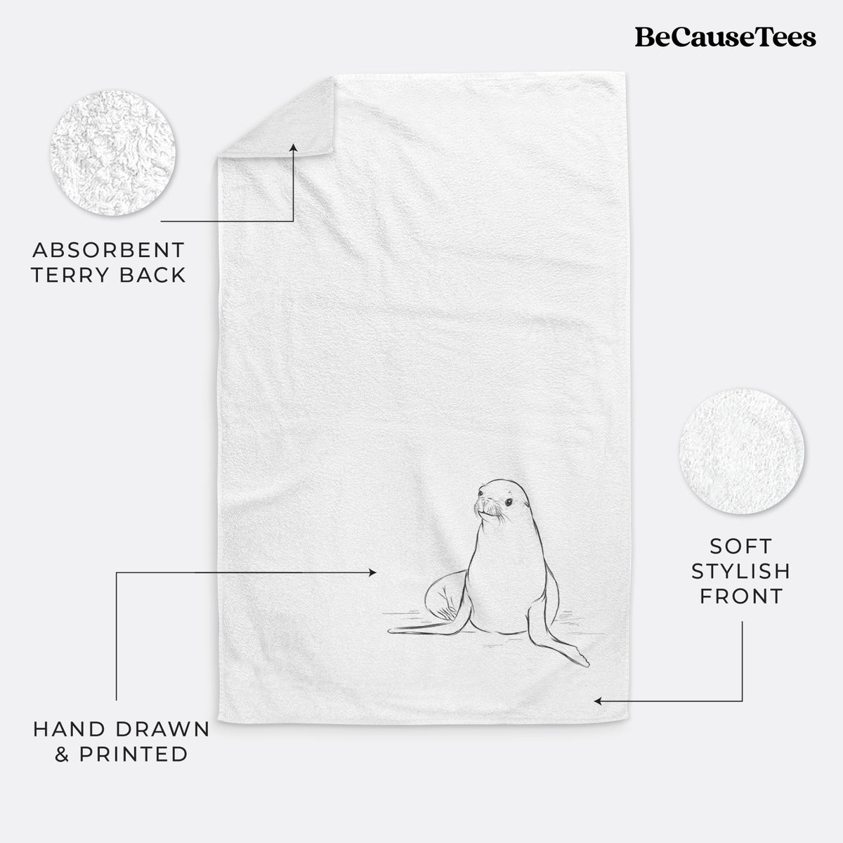 White hand towel printed with a black ink illustration of a California sea lion sitting upright.