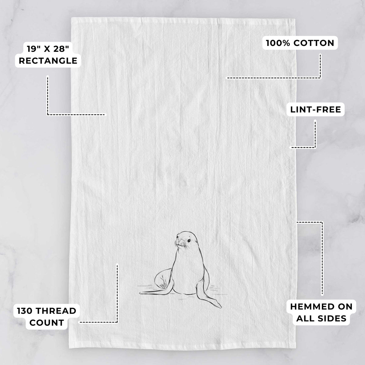 White tea towel printed with a black ink illustration of a California sea lion sitting upright, with feature labels: 19 by 28 inch rectangle, 100% cotton, lint-free, 130 thread count, hemmed on all sides.