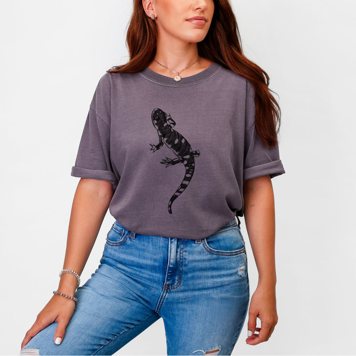 Woman wearing a Comfort Colors t-shirt printed with a detailed black ink illustration of a spotted California tiger salamander.