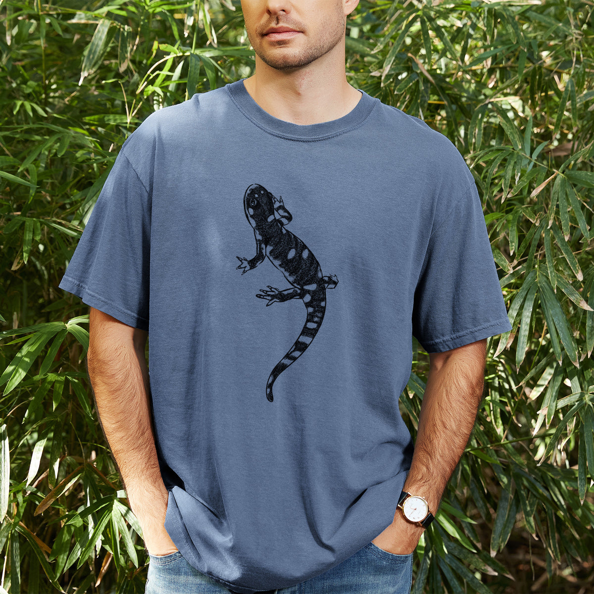 Man wearing a Comfort Colors t-shirt printed with a detailed black ink illustration of a spotted California tiger salamander, outdoors.