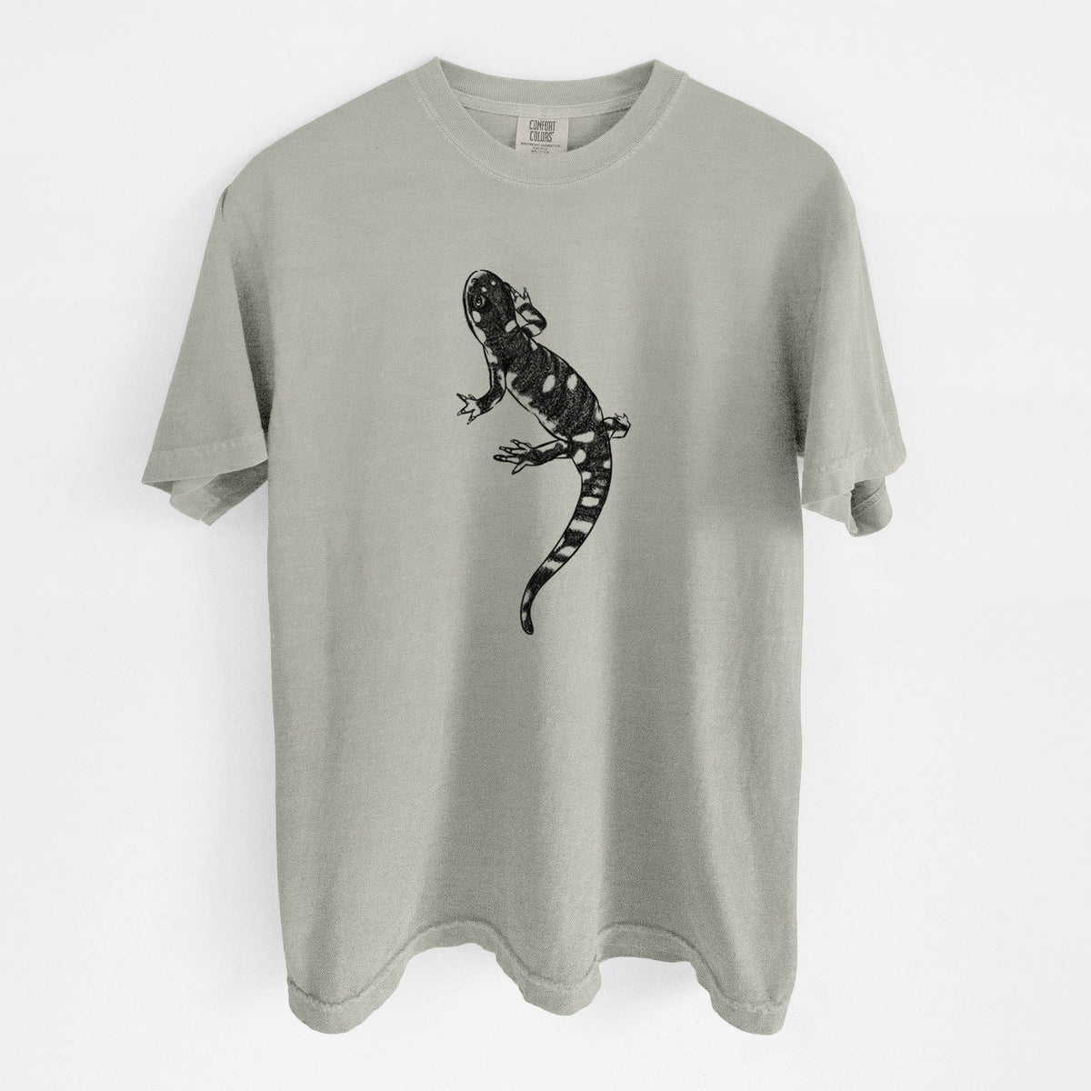 Sandstone beige Comfort Colors t-shirt laid flat, printed with a detailed black ink illustration of a spotted California tiger salamander.