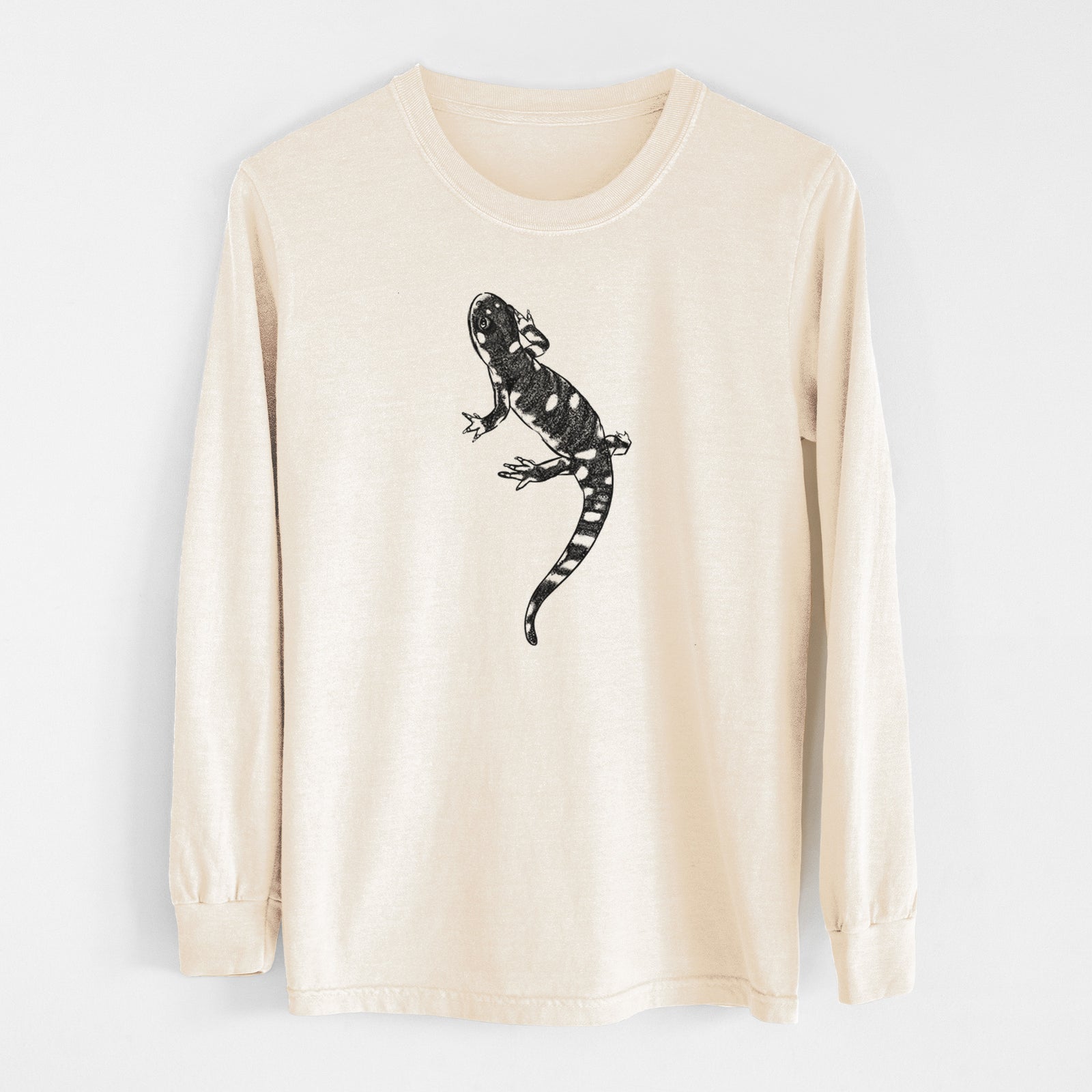 Ivory Comfort Colors long sleeve shirt laid flat, printed with a detailed black ink illustration of a spotted California tiger salamander.