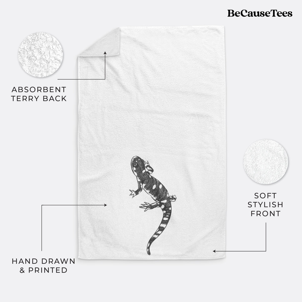 White hand towel printed with a detailed black ink illustration of a spotted California tiger salamander.