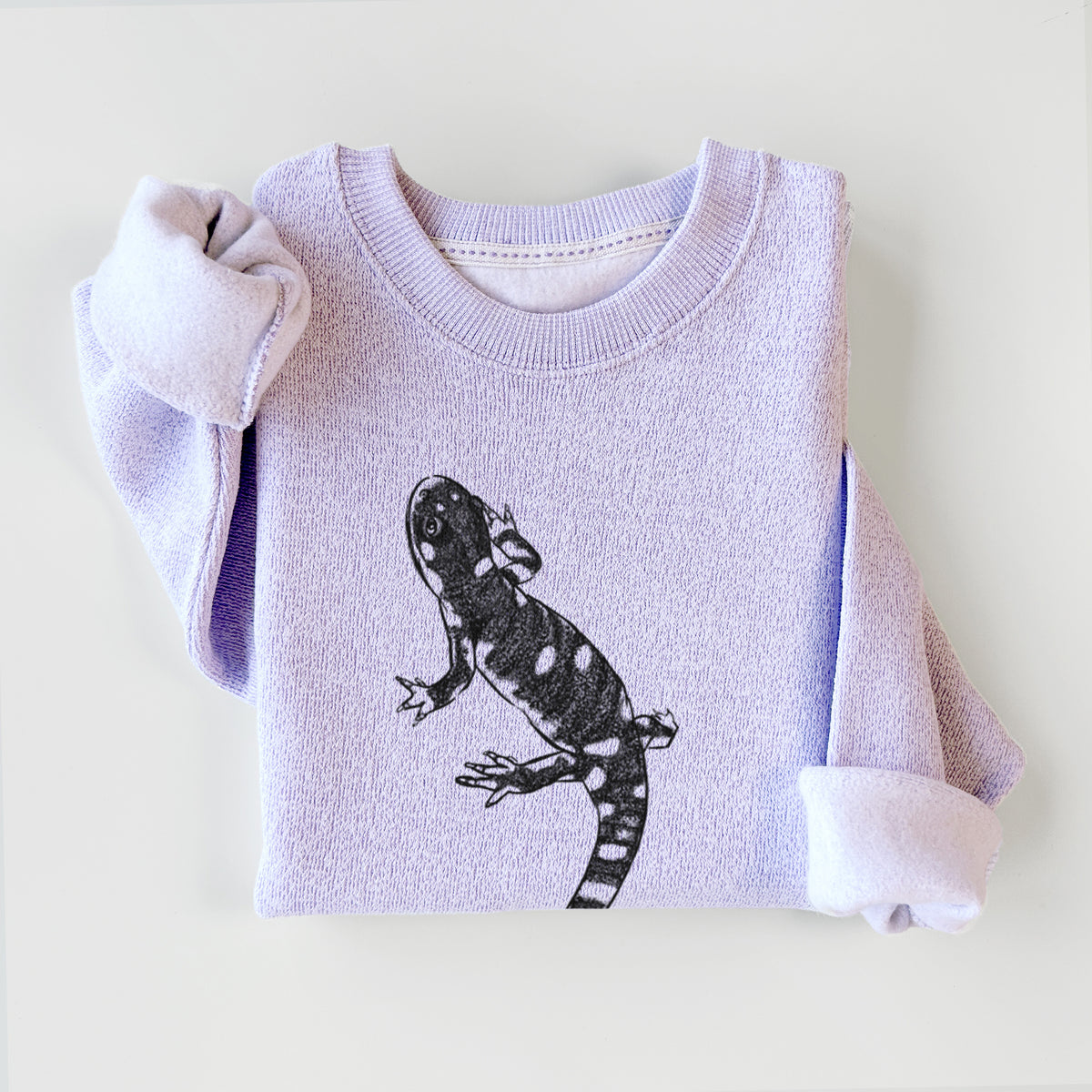 Ice purple knit sweatshirt printed with a detailed black ink illustration of a spotted California tiger salamander, styled flat.
