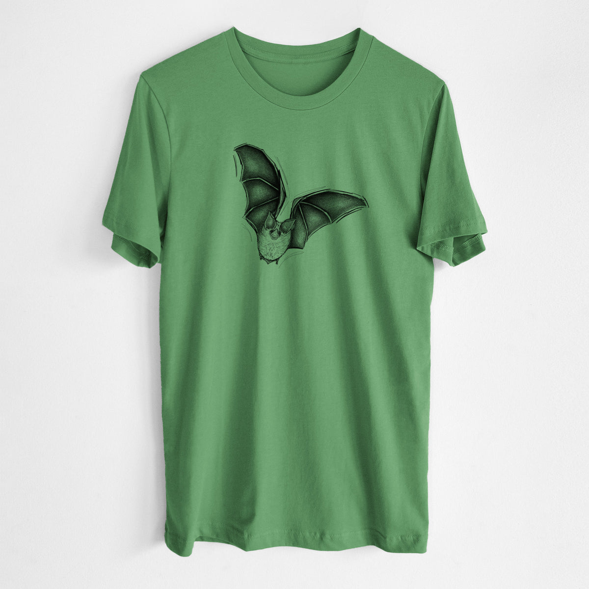 Leaf green lightweight cotton t-shirt laid flat, printed with a detailed black ink illustration of a California leaf-nosed bat in flight.