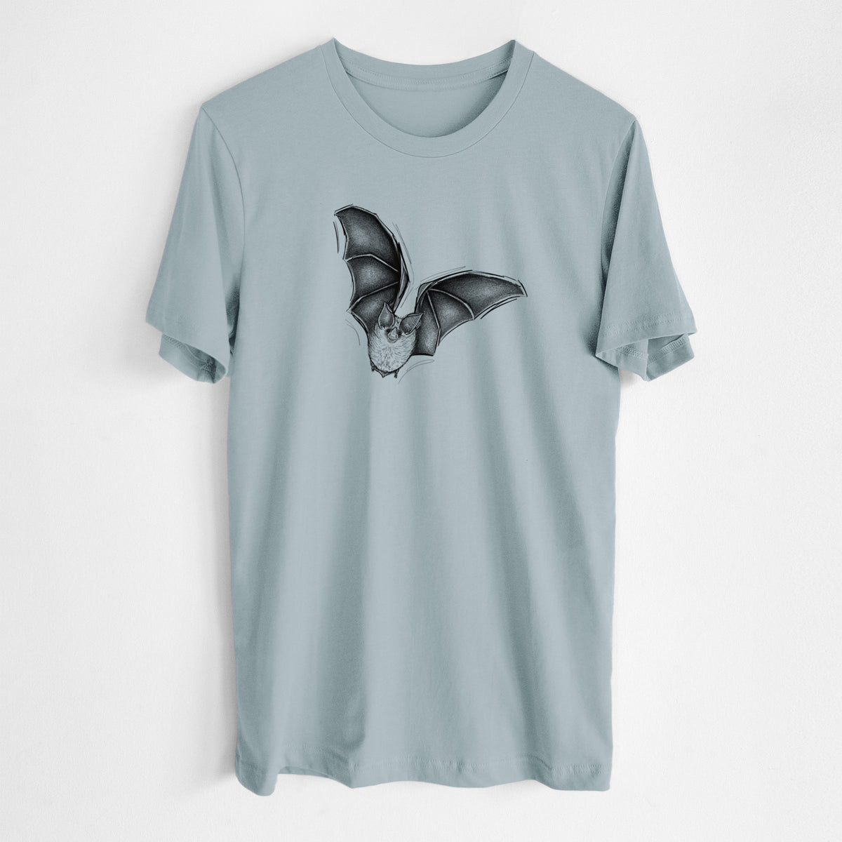 Vintage denim lightweight cotton t-shirt laid flat, printed with a detailed black ink illustration of a California leaf-nosed bat in flight.