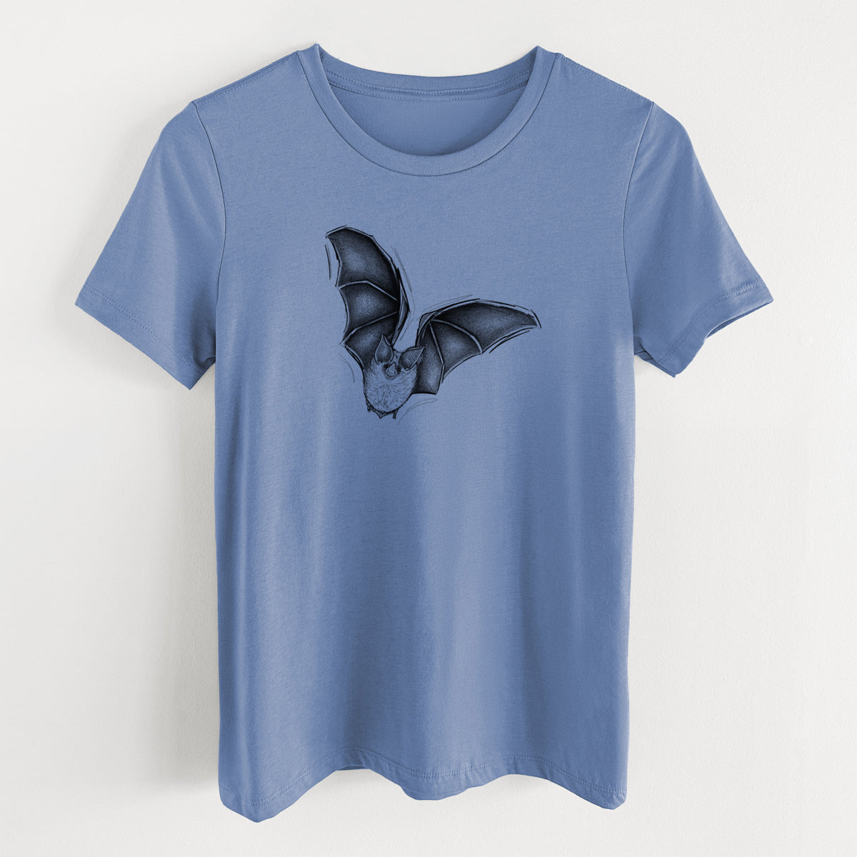 Blue bell women's relaxed fit cotton t-shirt laid flat, printed with a detailed black ink illustration of a California leaf-nosed bat in flight.