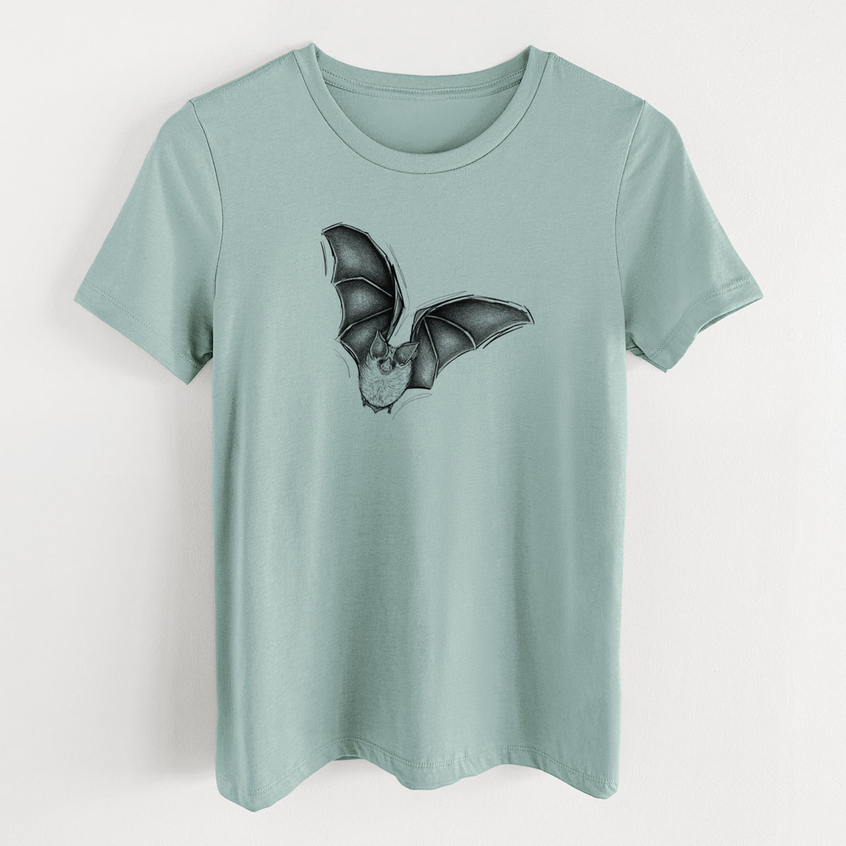 Dusty blue women's relaxed fit cotton t-shirt laid flat, printed with a detailed black ink illustration of a California leaf-nosed bat in flight.