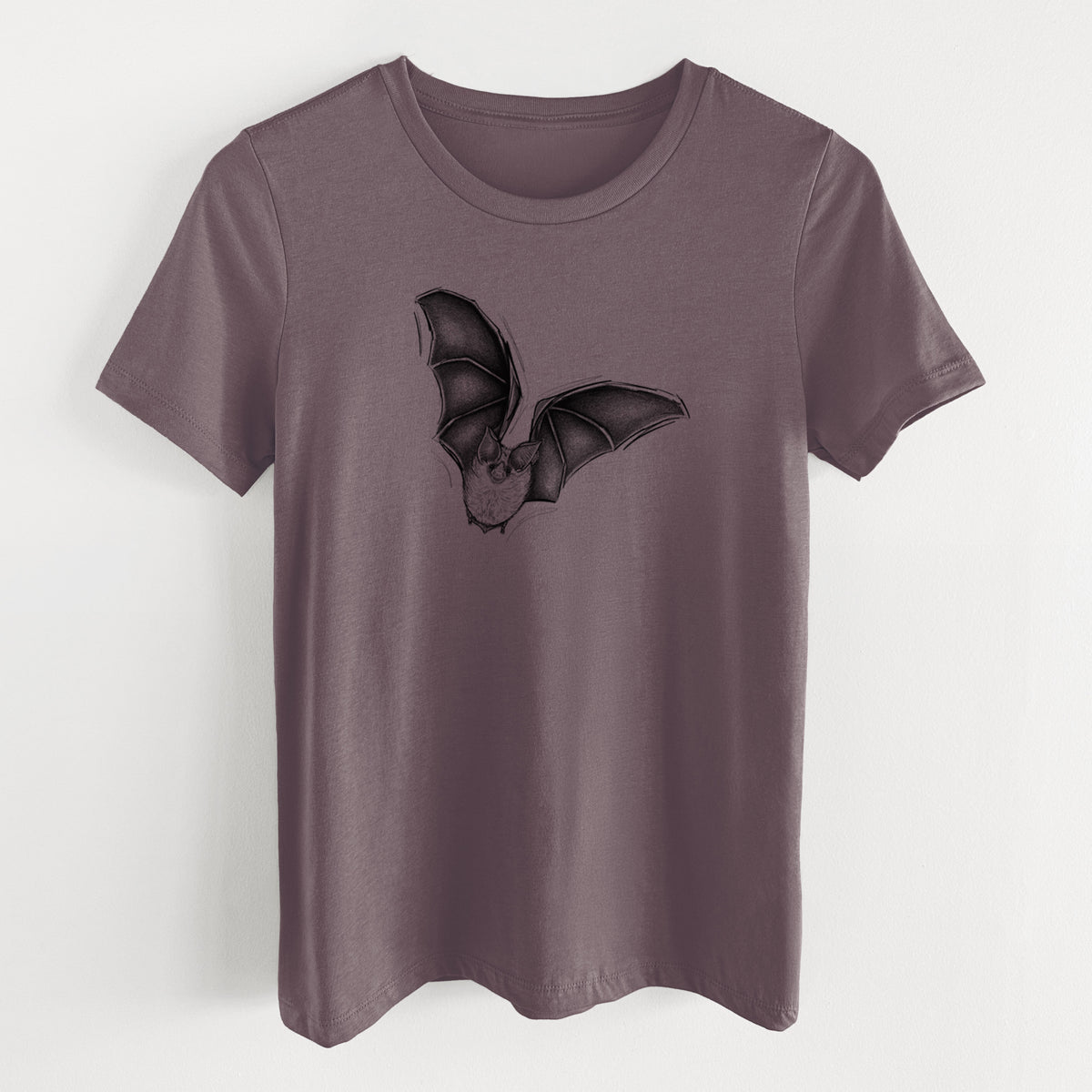 Purple storm women's relaxed fit cotton t-shirt laid flat, printed with a detailed black ink illustration of a California leaf-nosed bat in flight.