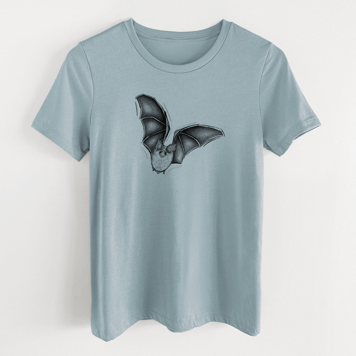 Vintage denim women's relaxed fit cotton t-shirt laid flat, printed with a detailed black ink illustration of a California leaf-nosed bat in flight.