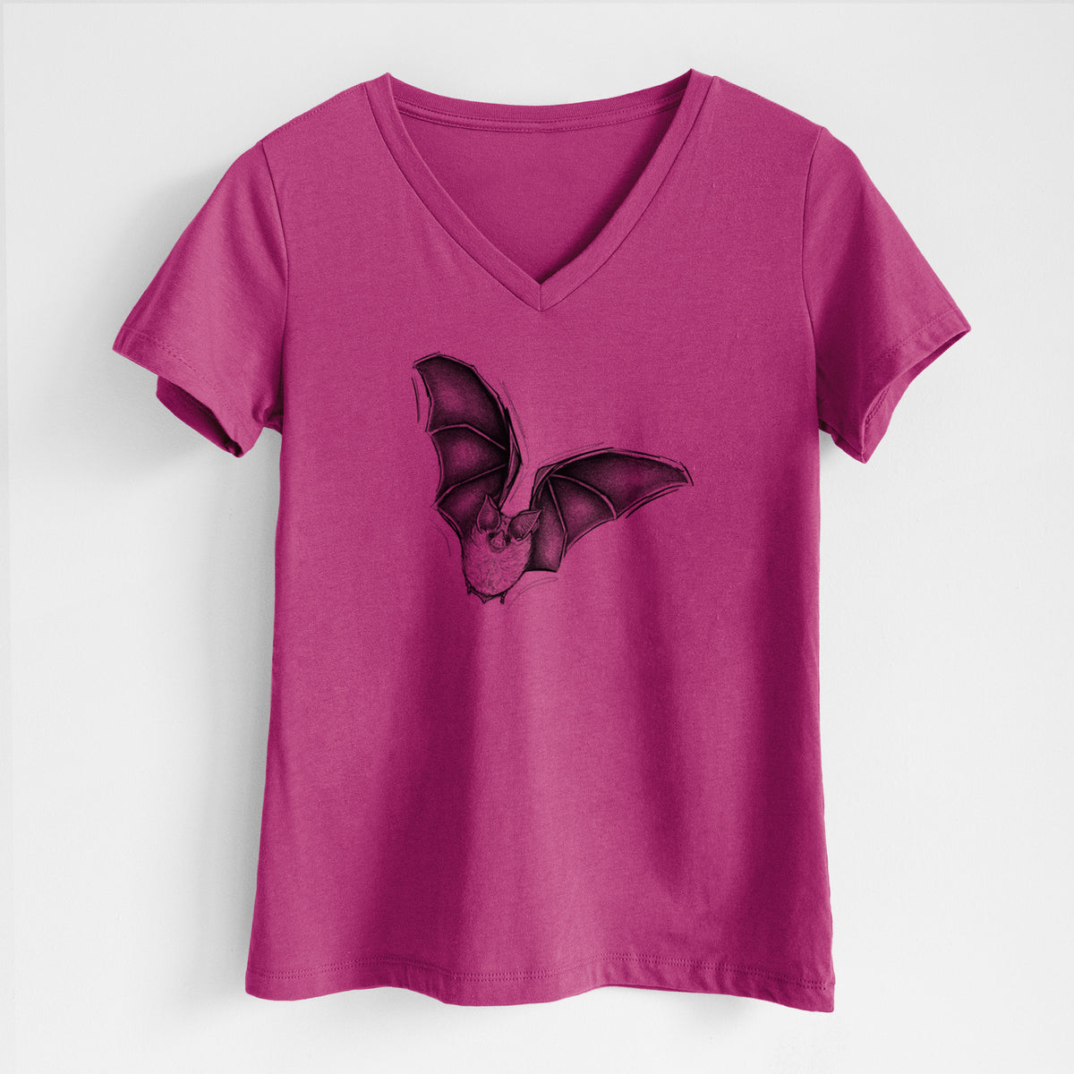 Berry pink women's relaxed fit cotton V-neck t-shirt laid flat, printed with a detailed black ink illustration of a California leaf-nosed bat in flight.
