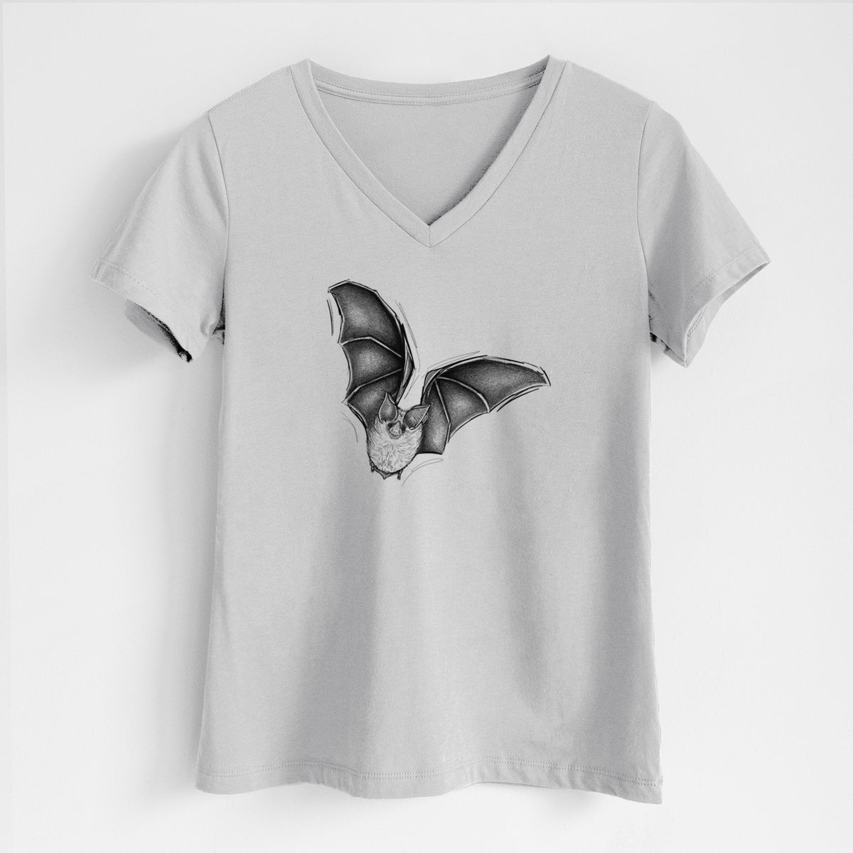 Lunar grey women's relaxed fit cotton V-neck t-shirt laid flat, printed with a detailed black ink illustration of a California leaf-nosed bat in flight.