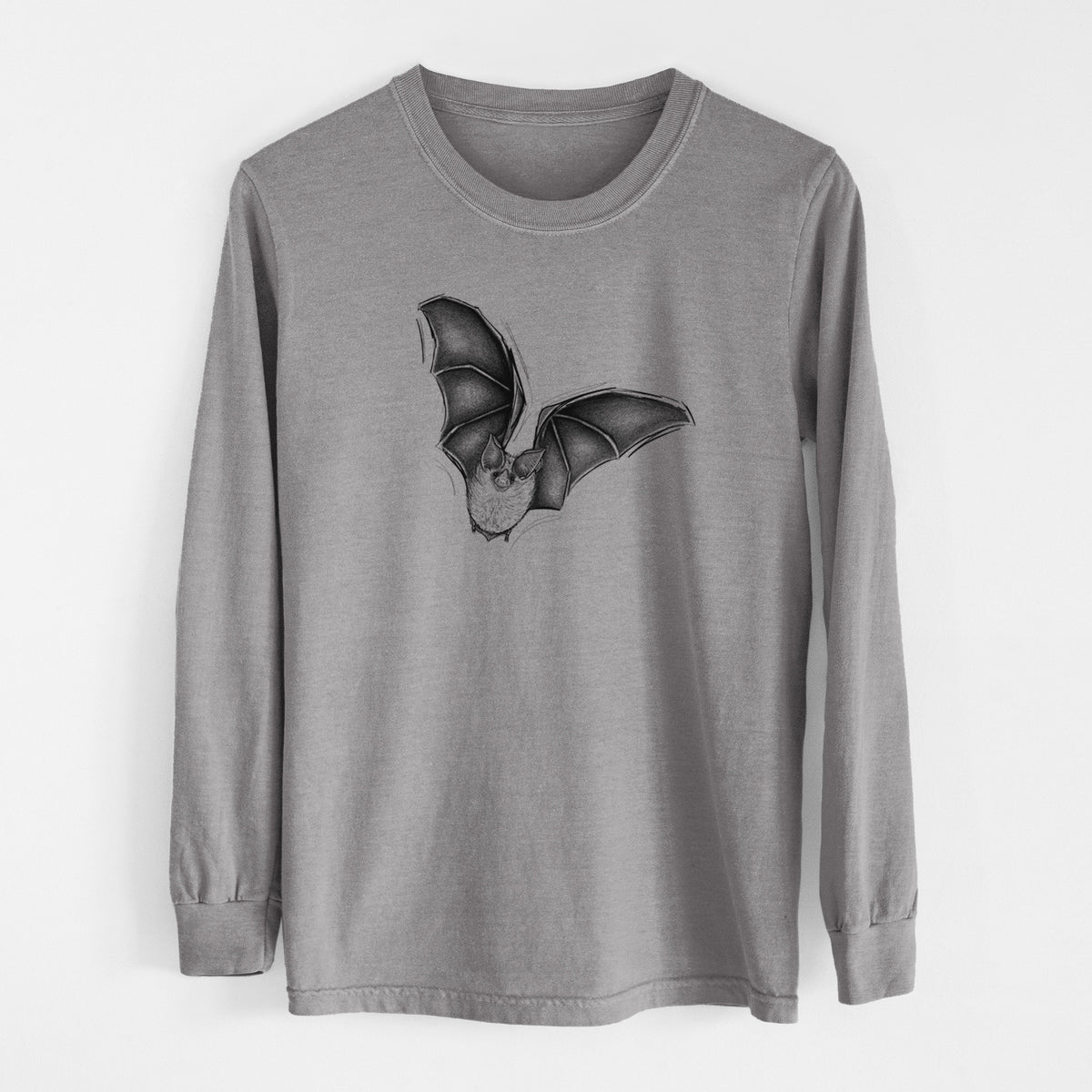 Grey Comfort Colors long sleeve shirt laid flat, printed with a detailed black ink illustration of a California leaf-nosed bat in flight.