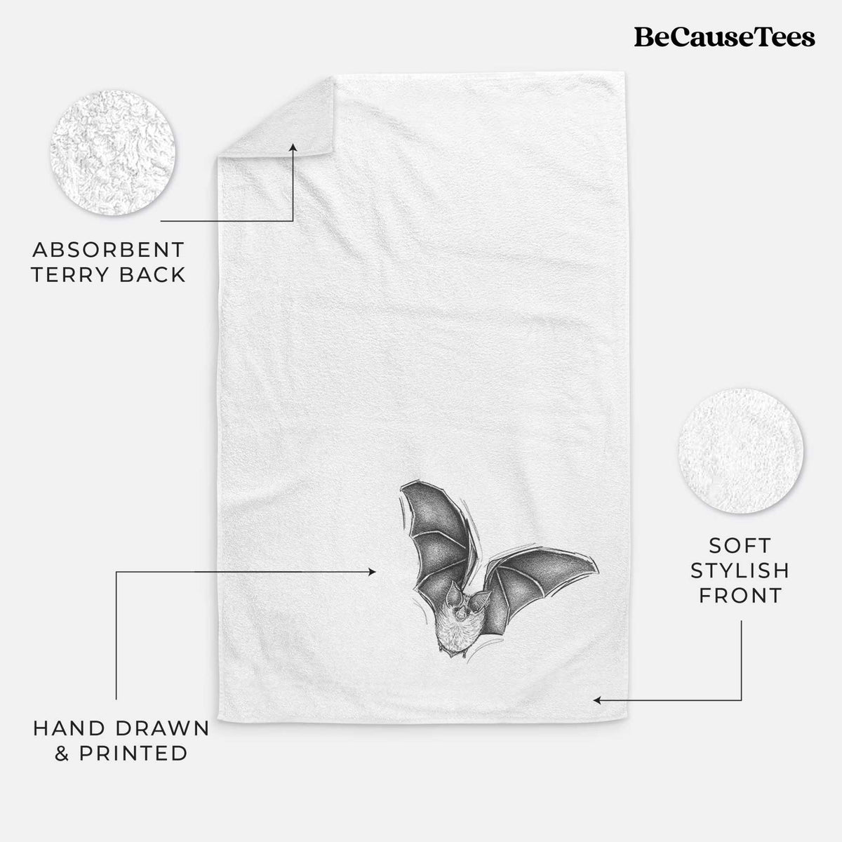 White hand towel printed with a detailed black ink illustration of a California leaf-nosed bat in flight.