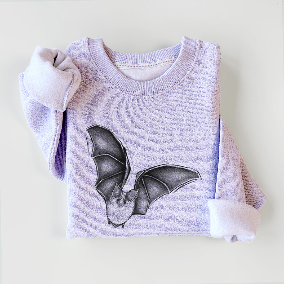 Ice purple knit sweatshirt printed with a detailed black ink illustration of a California leaf-nosed bat in flight, styled flat.