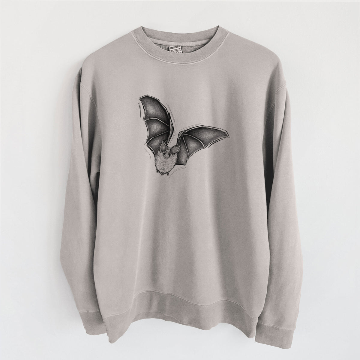 Cement grey pigment dyed crewneck sweatshirt laid flat, printed with a detailed black ink illustration of a California leaf-nosed bat in flight.