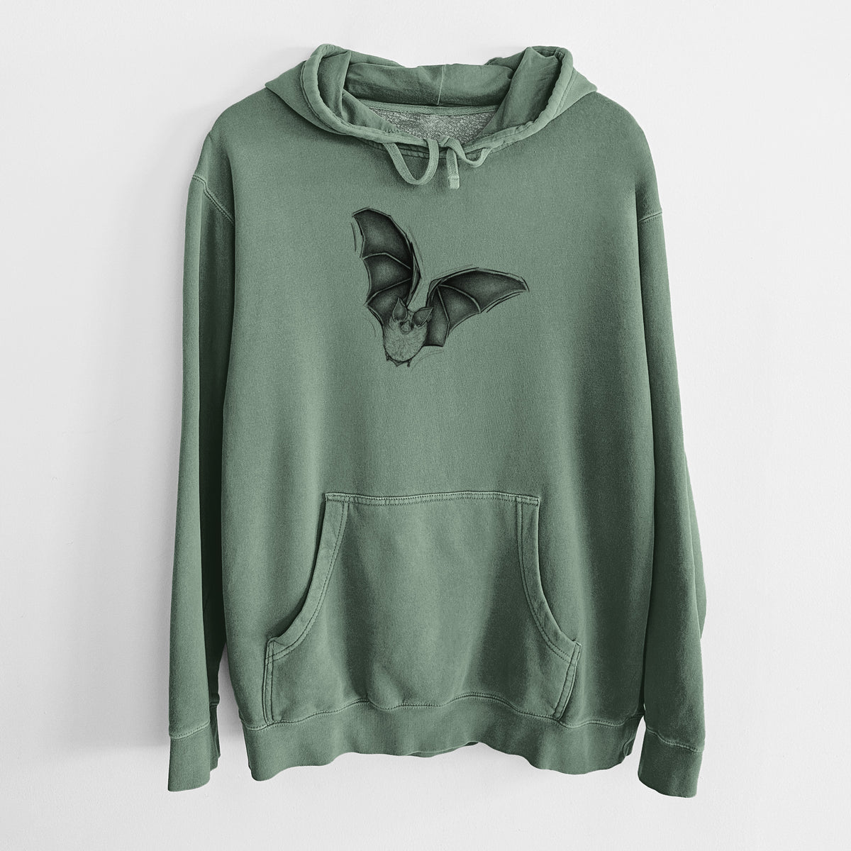 Alpine green pigment dyed hoodie laid flat, printed with a detailed black ink illustration of a California leaf-nosed bat in flight.