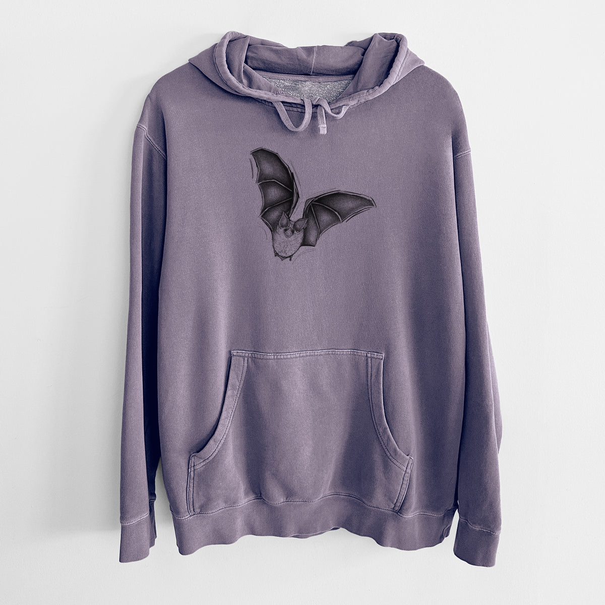 Plum purple pigment dyed hoodie laid flat, printed with a detailed black ink illustration of a California leaf-nosed bat in flight.